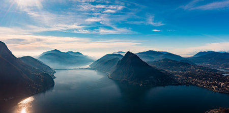 Lugano, Switzerland. Amazing aerial view of the Swiss city, surrounded by lake and mountains.の写真素材