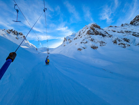 Ski slopes and mountains, Melchsee-Frutt mountain resort village, Switzerland in winterの写真素材