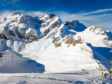 Ski slopes and mountains, Melchsee-Frutt mountain resort village, Switzerland in winterの写真素材