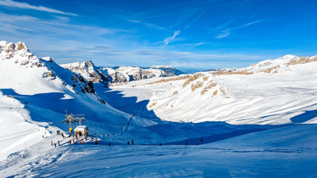 Ski slopes and mountains, Melchsee-Frutt mountain resort village, Switzerland in winterの写真素材