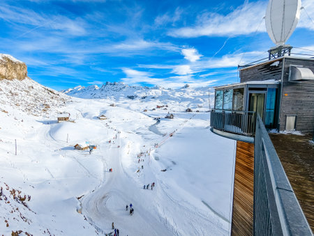 Ski slopes and mountains, Melchsee-Frutt mountain resort village, Switzerland in winterの写真素材
