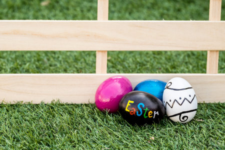 Easter Eggs on Lawn Background