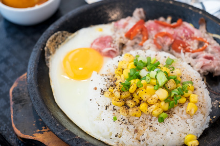BBQ beef pepper rice with egg in hot pan, Foodの写真素材