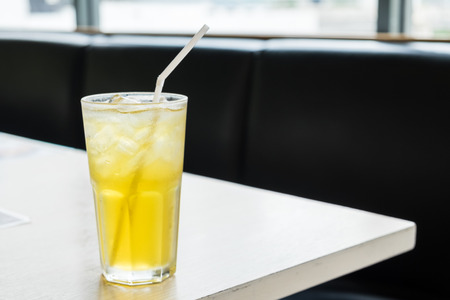 Ice Chrysanthemum tea on wood backgroundの写真素材