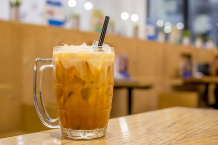 Thai ice milk tea on wooden table, Drink, Copy Spaceの写真素材
