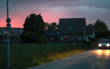 Rural area with car by night