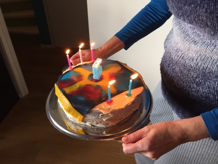 Birthday cake boy five years old with magic carpetの写真素材