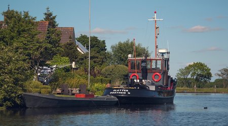 Dutch landscape with water canals in Amsterdam, the Netherlandsの写真素材