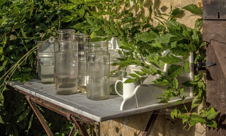 Table with glasses in the sun
