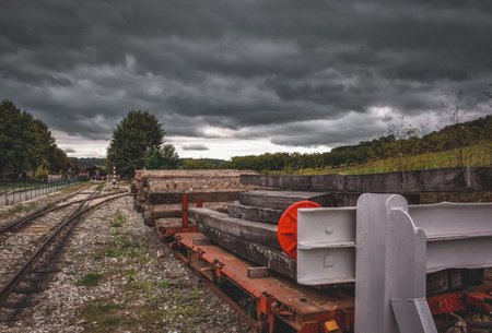 Railroad crossing against cloudy backdrop in France