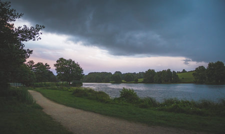 Lake with trees in the sunset in france
