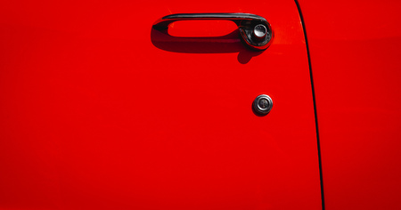 Detail of a red old fashioned sport carの写真素材