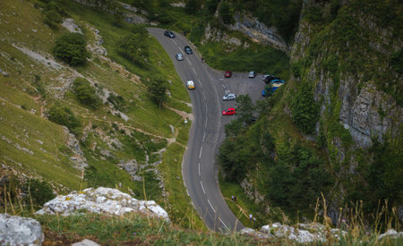 Cliffs of Cheddar Gorge from high viewpoint. High limestone cliffs in canyon at Mendip Hills in...