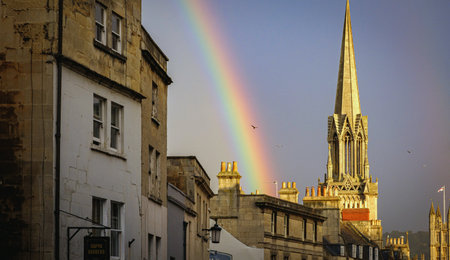 Background with rainbow over the buildings of Bath in the united kingdom england