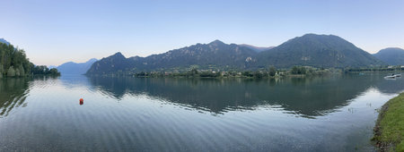 lake idro in italy between mountains and water in summer
