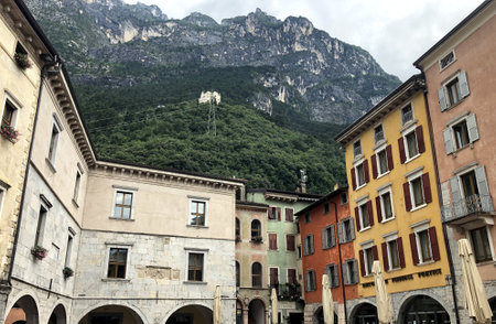 old houses on a street in riva del gardaの写真素材