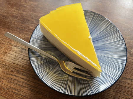 cheesecake pie lemon plate table candles birthday yellowの写真素材