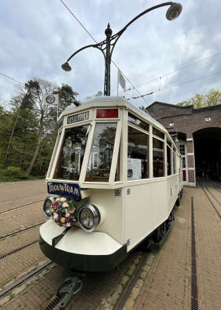 old dutch tram used for weddings in amsterdam netherlandsの写真素材