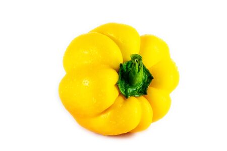 Fresh yellow capsicum paprika isolated on white. Healthy eating concept. Bell pepper isolated on white.の写真素材