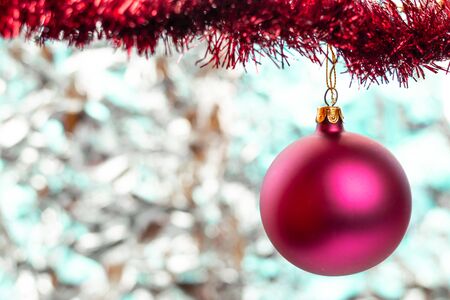 Christmas balls, wine glass, christmas decorations on silver abstract background. Christmas composition.の写真素材