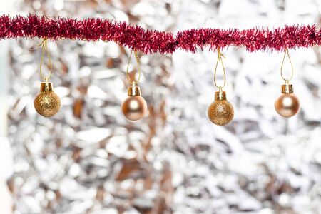 Christmas balls, wine glass, christmas decorations on silver abstract background. Christmas composition.の写真素材