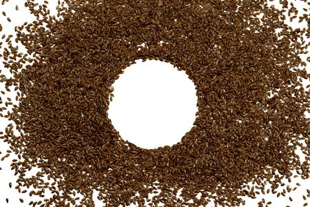 Flax seeds, background or texture isolated on white. lose-up.の写真素材