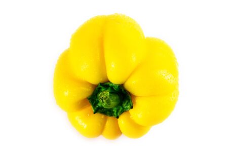 Fresh yellow capsicum paprika isolated on white. Healthy eating concept. Bell pepper isolated on white.の写真素材