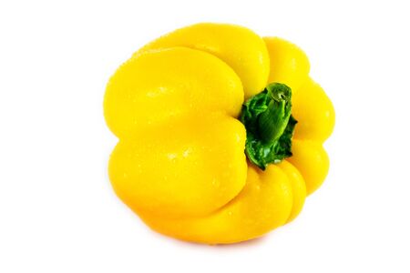 Fresh yellow capsicum paprika isolated on white. Healthy eating concept. Bell pepper isolated on white.の写真素材