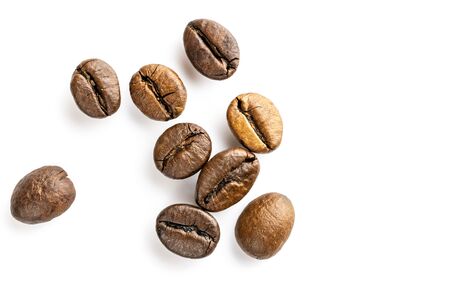 Roasted coffee beans for espresso, cappuccino on white background.の写真素材
