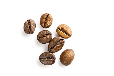 Roasted coffee beans for espresso, cappuccino on white background.の写真素材