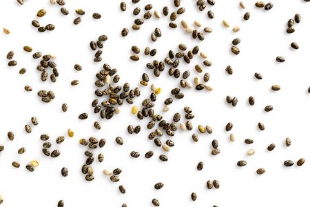 Superfood chia seeds, top view, isolated on white background. Healthy breakfast, vitamin snack, diet and healthy eating concept.の写真素材