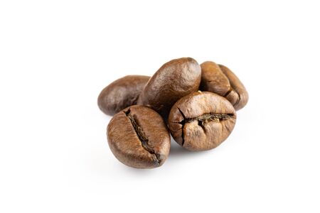 Roasted coffee beans for espresso, cappuccino on white background.の写真素材