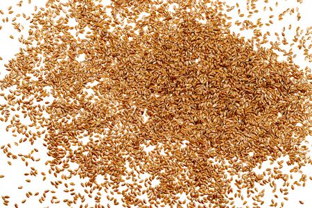 Flax seeds, background or texture isolated on white. lose-up.の写真素材