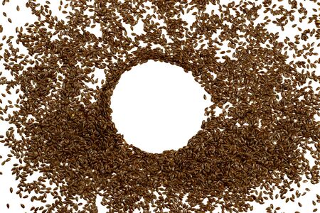 Flax seeds, background or texture isolated on white. lose-up.の写真素材