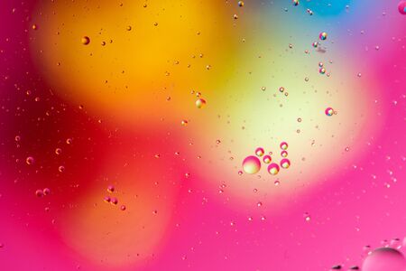Abstract background, colorful gradient colors. Oil drops in water.の写真素材