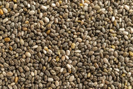 Organic chia seeds texture. Healthy Superfood. Healthy breakfast, vitamin snack, diet and healthy eating concept.の写真素材