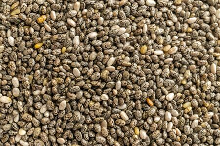 Organic texture. Chia seeds. Healthy breakfast, vitamin snack, diet and healthy eating concept. Healthy Superfood.の写真素材