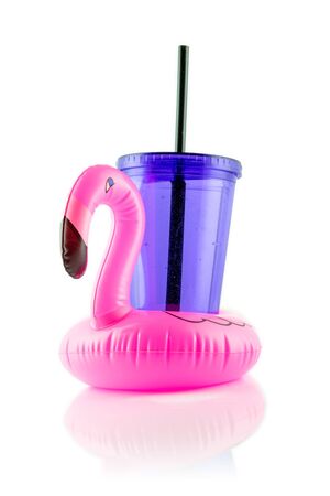 Inflatable ring pink toy. Rubber flamingo for pool. Tropical driの写真素材