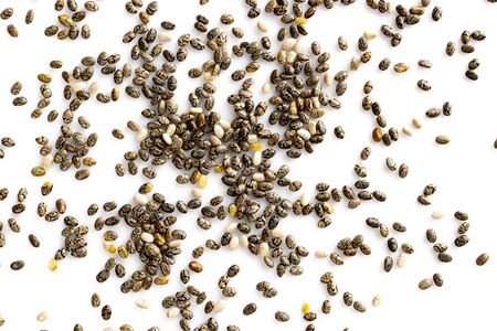Superfood chia seeds, top view, isolated on white background. Healthy breakfast, vitamin snack, diet and healthy eating concept.の写真素材