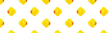 Duck background. Yellow plastic ducks. Yellow seamless patternの写真素材