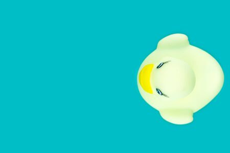 Duck background. Yellow rubber toy. Pay in pool.の写真素材