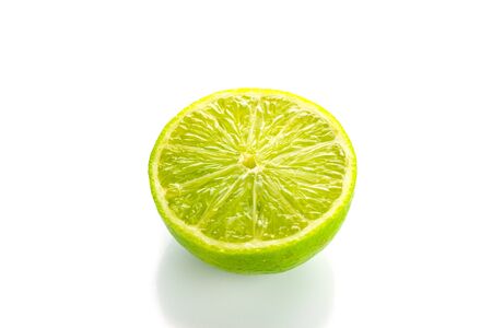 Lime juice. Raw green fruit lemon. Citrus backgroundの写真素材