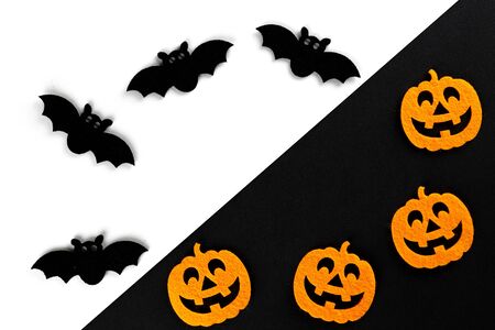 Halloween icons. scary pumpkin decoration isolated on black backの写真素材