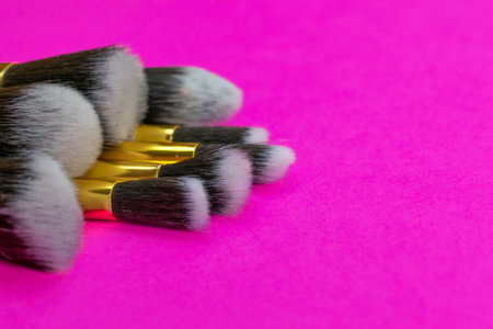 Make brush powder. Drawing cosmetic products isolated on pink background with copy space. Beauty...