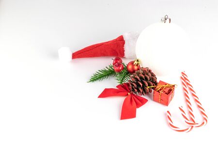 New year, Xmas decoration isolated on white background. Red Christmas decorations.Holiday festive celebration concept.Banner mock up for display of product or design contentの写真素材