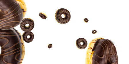 Glazed sprinkles. Chocolate sweet fresh donuts in motion flying on white background.