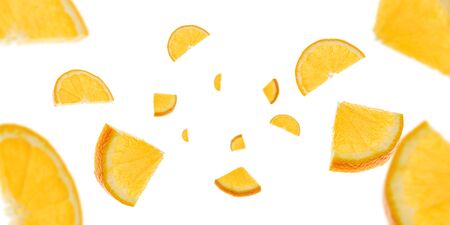 Orange slice isolated. Citrus fruit tangerine falling in air. Selective focusの写真素材