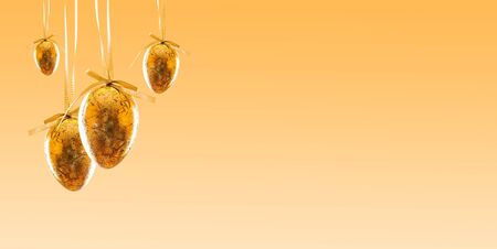 Happy Easter realistic golden shine decorated eggs on festival background. For greeting card, promotion, poster, flyer, web-banner, articleの写真素材