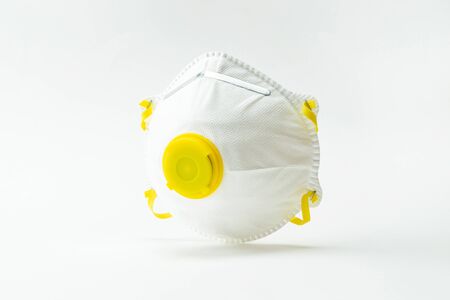 COVID-19 infection medical background. Medical safety filter mask on white. Dangerous asian ncov coronavirus and bacteria protective face air pollution, environmental and protectionの写真素材
