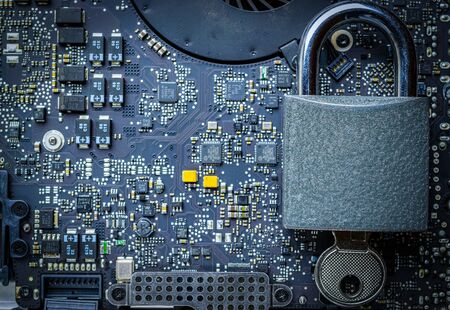 Cyber security lock. Security computer Data Internet protection with lock, key on microscheme chip. Hacker attack and data breach, information leak concept.の写真素材
